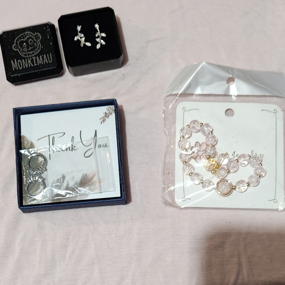 Bracelet and 2 sets of earrings